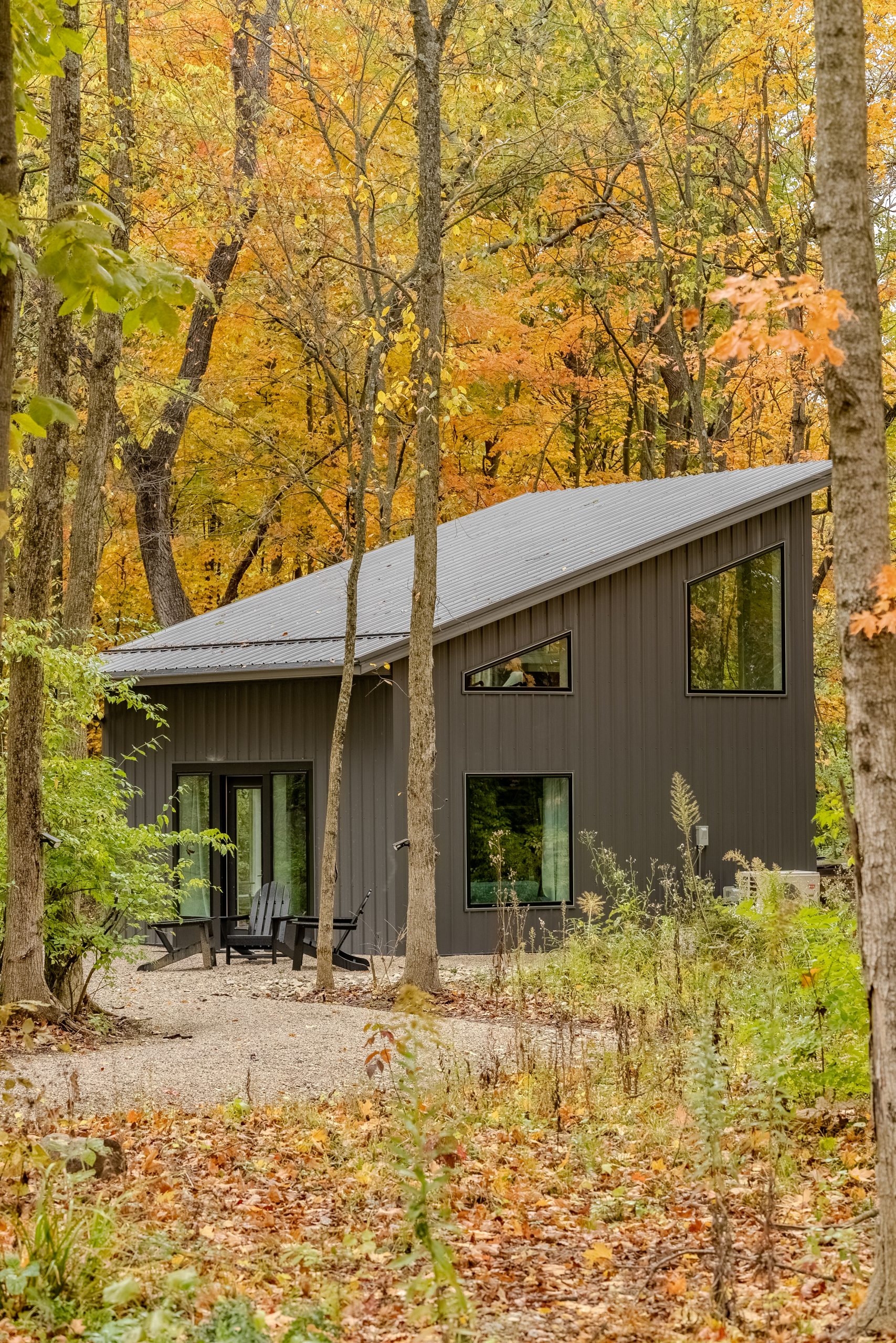 Cabin in the woods surrounded by fall foliage at Retreat 21 near Columbus, Ohio