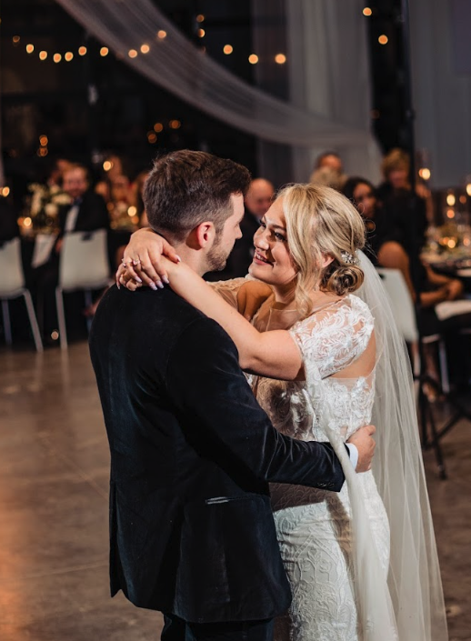 Bride and groom share a first dance alone during wedding reception at Retreat 21 near Columbus, Ohio