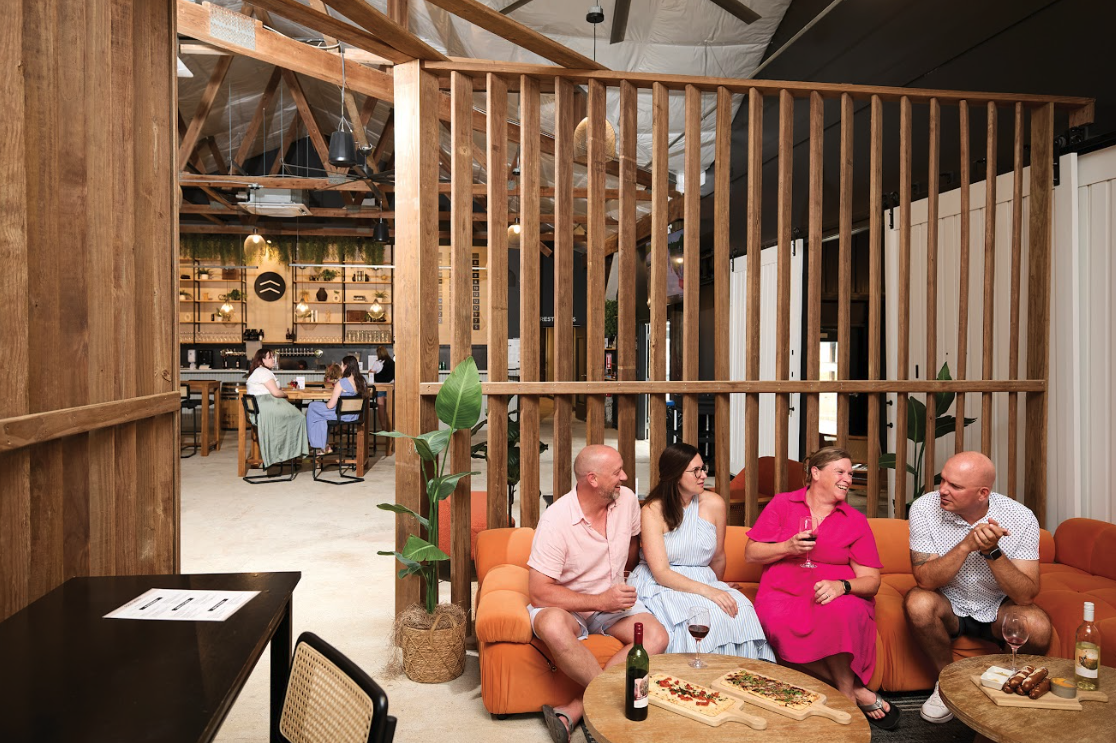Cider Nook Full The Vineyard Room at The Taphouse with natural light, wood interiors, and tables set for wine tasting or private events