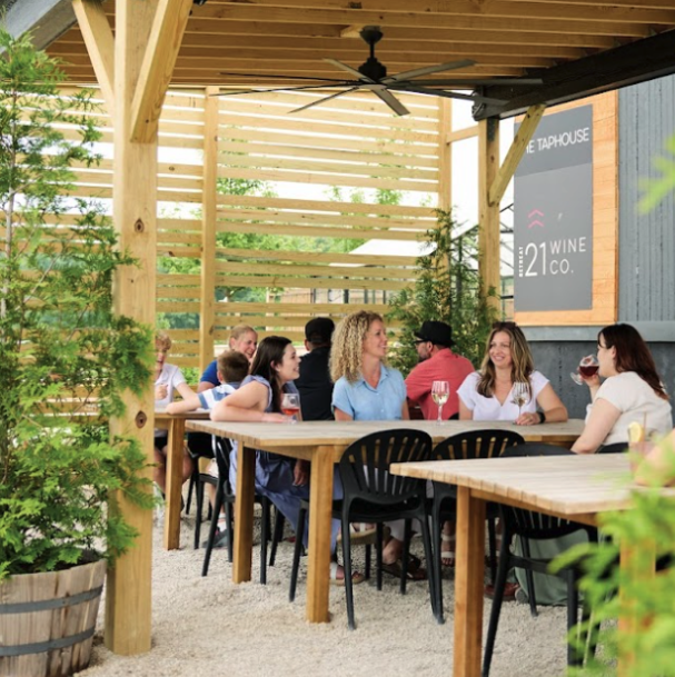 Interior of the Cider Nook at The Taphouse, a cozy semi-private space with seating for small groups