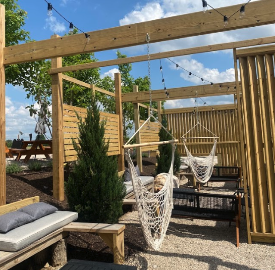 Interior of the Cider Nook at The Taphouse, a cozy semi-private space with seating for small groups