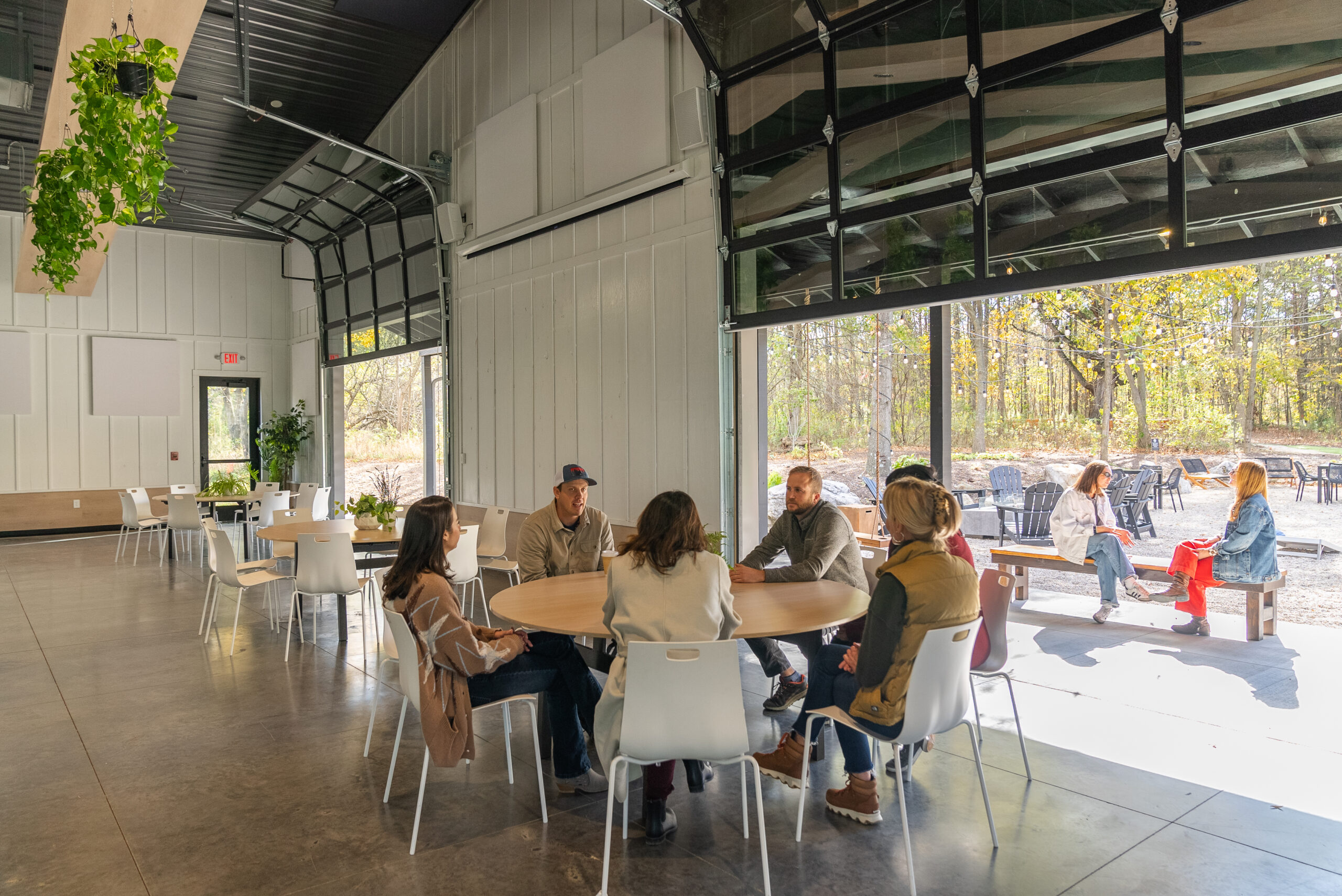 Small group breakout session during corporate retreat outdoors in Ohio